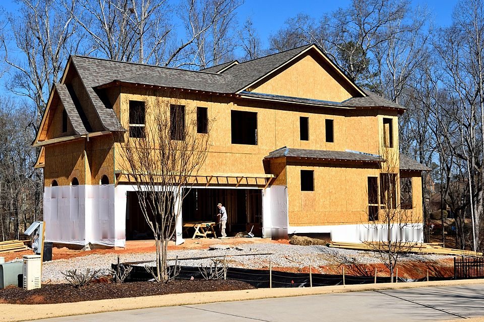 Two-story home framed and sheathed in plywood during construction